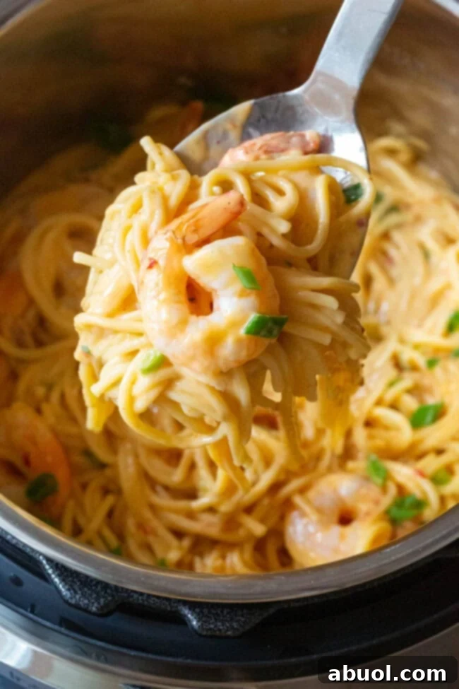 Delectable Instant Pot Bang Bang Shrimp Pasta, a quick and spicy dinner solution
