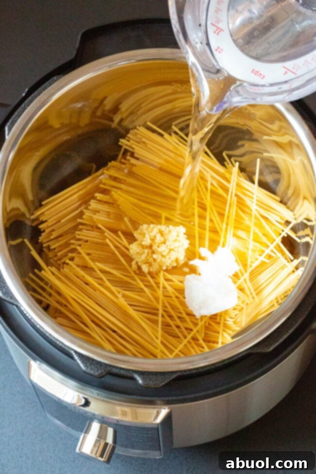 Ingredients laid out for making Instant Pot Bang Bang Shrimp Pasta