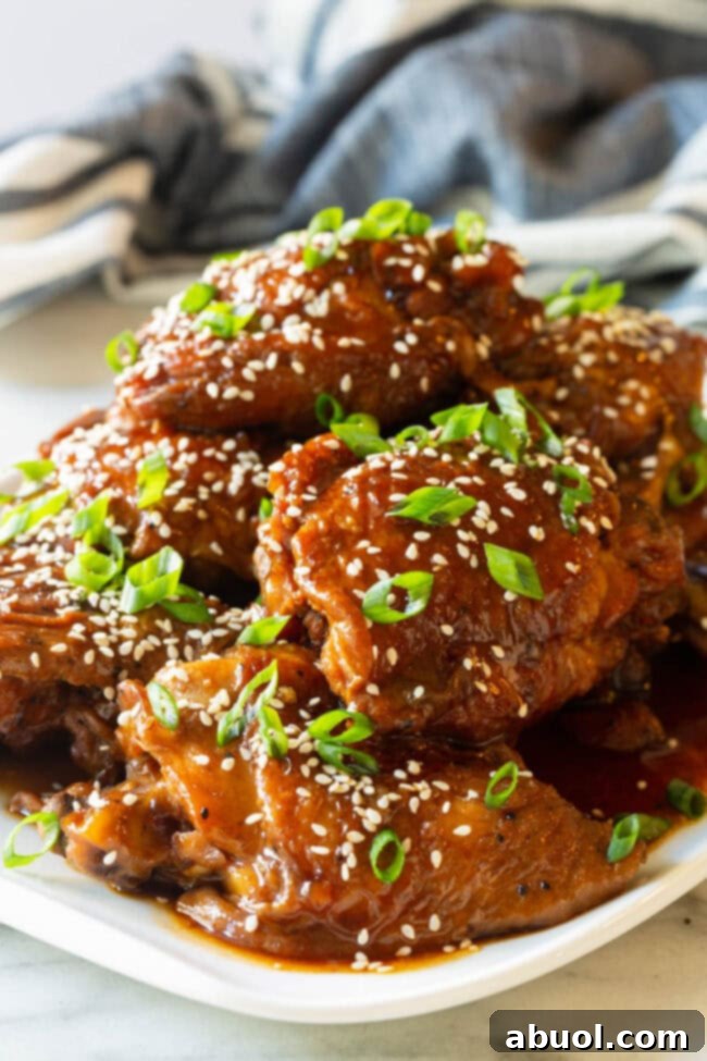 Instant Pot Soy Sauce Chicken piled on a plate - Asian Chicken Thighs Recipe