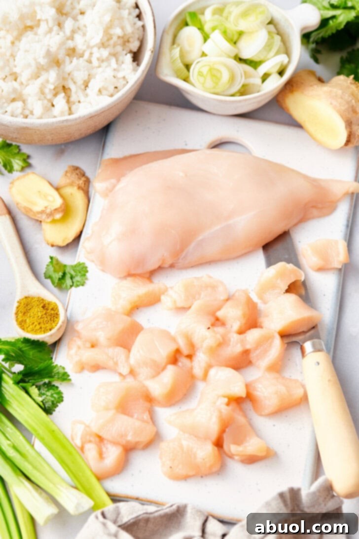 Chop chicken for this Classic Thai Fried Rice Recipe.
