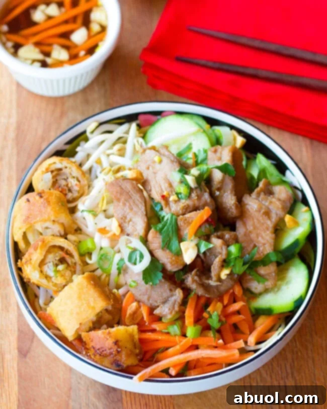 overhead view of Bun Cha Gio in a big bowl with chopsticks. 