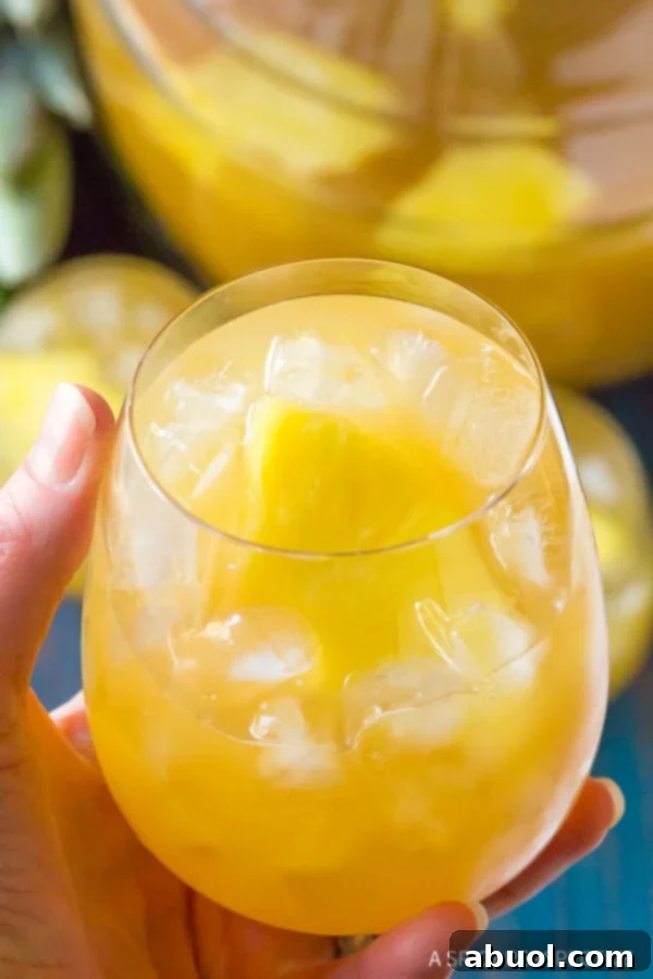Goombay Smash Recipe - hand held in glass