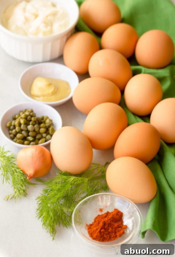 Ingredients for making creamy deviled eggs filling.