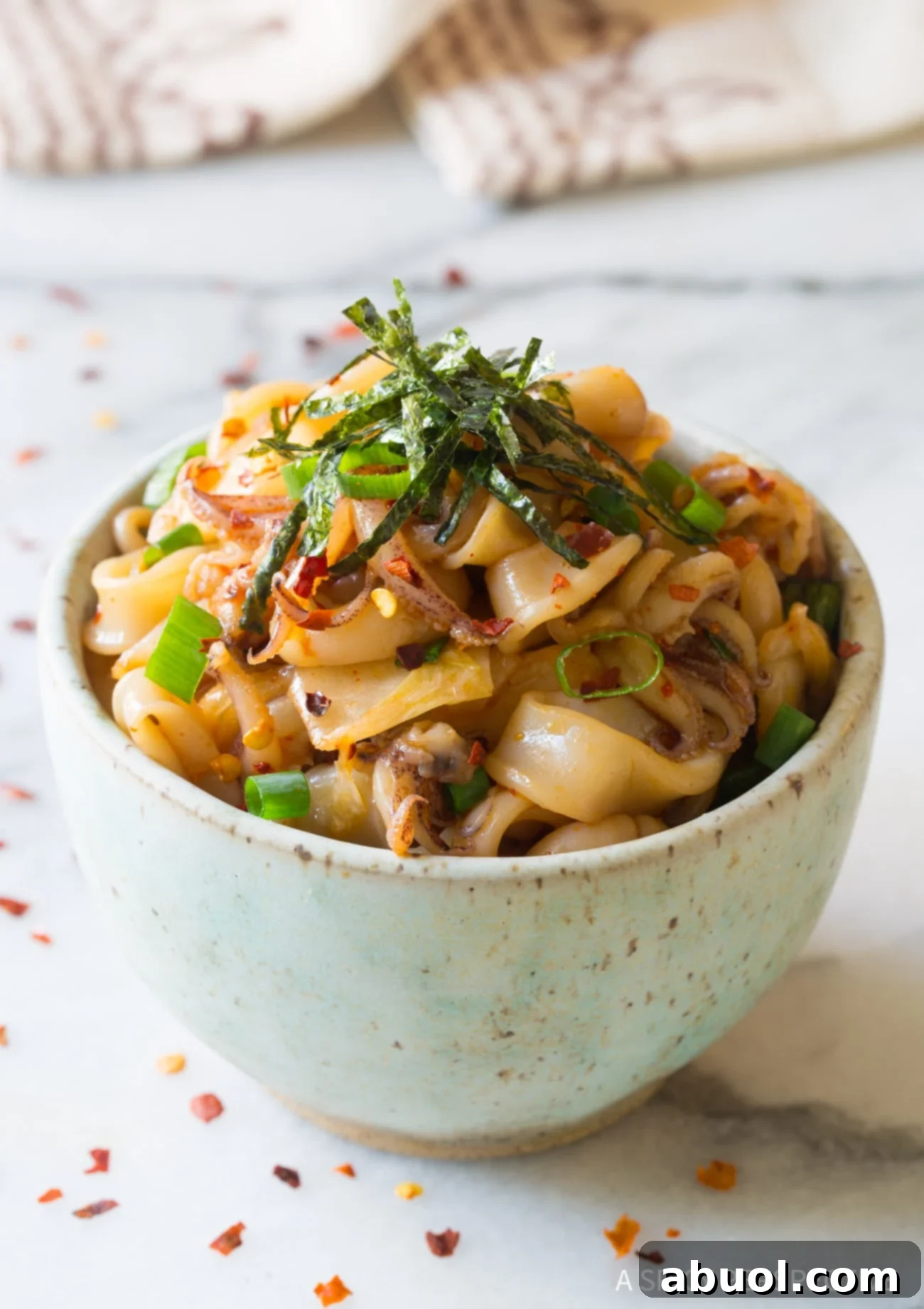 Simple Hawaiian Tako Poke Recipe (Octopus or Squid!) in a white bowl