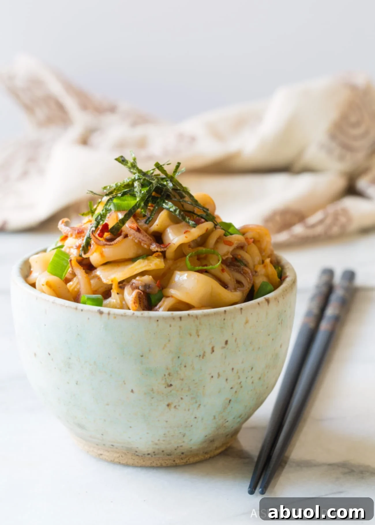 Octopus poke in bowl with chopsticks 