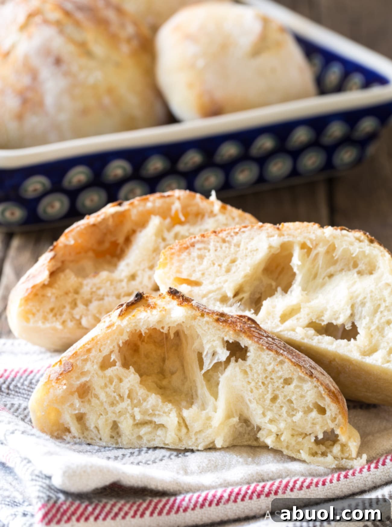 Fluffy Croatian Lepinja Bread 4 Bubbly Lepinja Bread Recipe - loaves cut open to expose air bubbles.