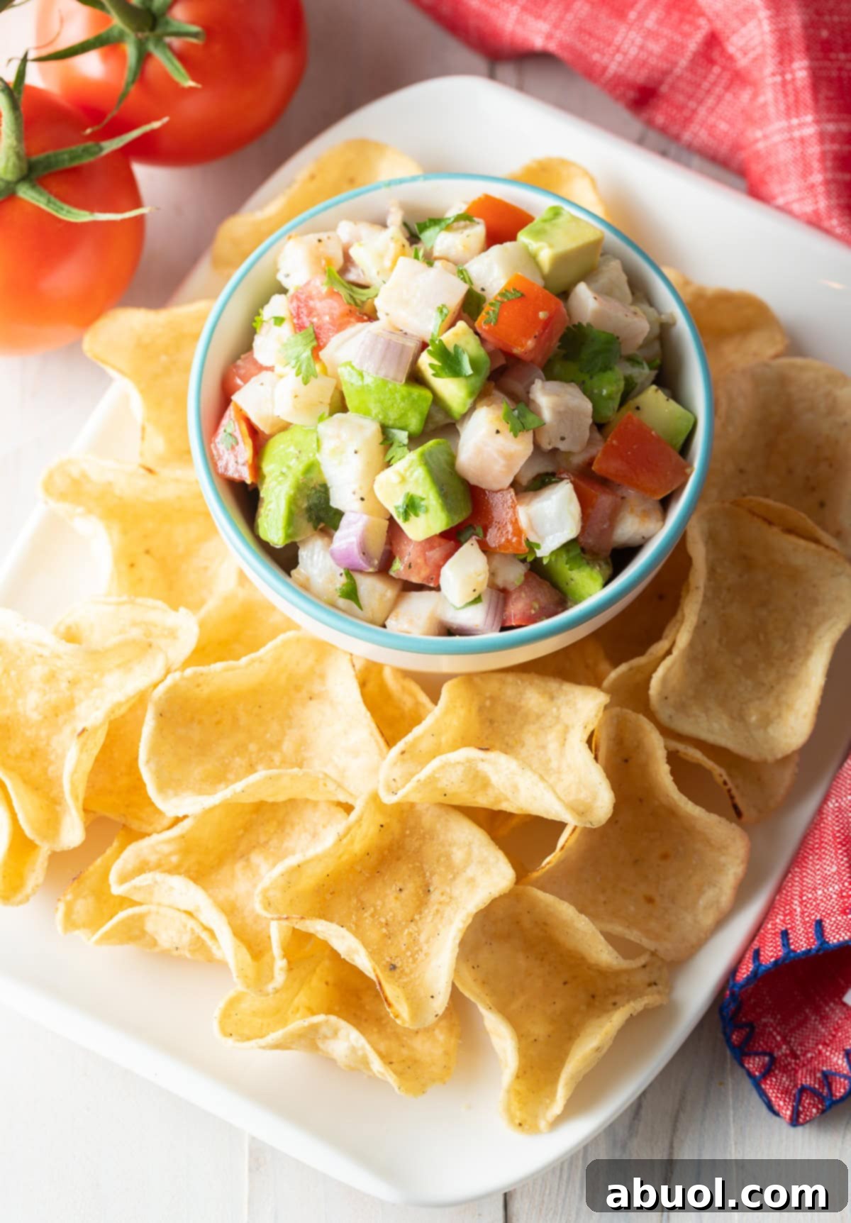 Seafood Ceviche on platter with fresh avocado and tomato