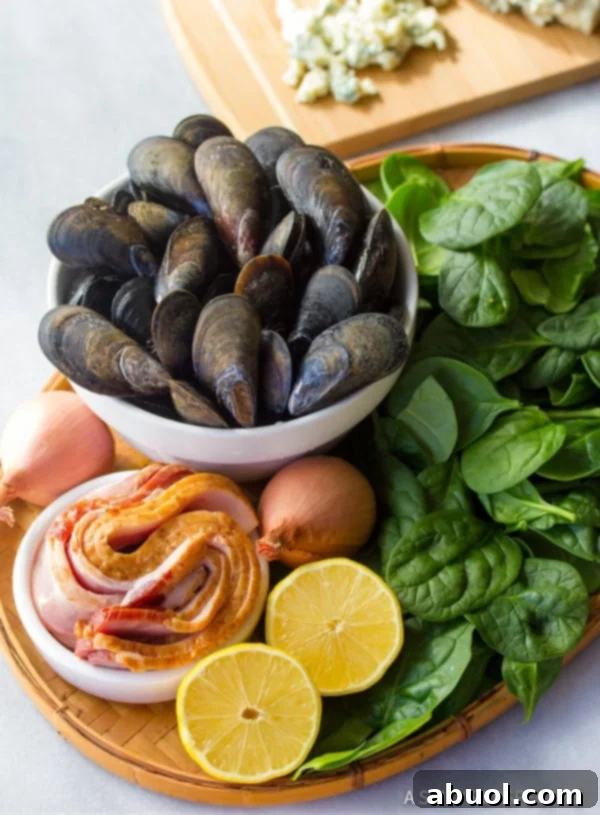 The cooking process of Mussels with Blue Cheese and Bacon in a large pan