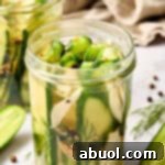 Best Homemade Refrigerator Pickles Recipe - the best recipe for dill pickles - front view of jar