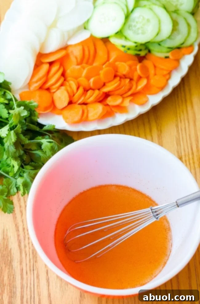 Banh Mi marinade ingredients with chicken in a bowl