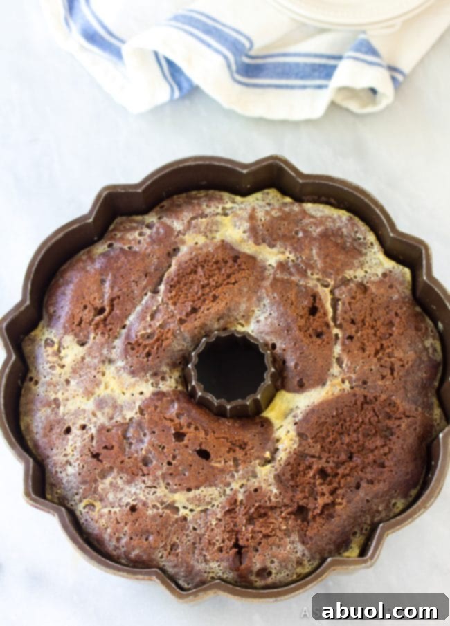 The baked Chocoflan, cooling in its bundt pan after being removed from the water bath.