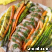 Healthy Grilled Pork Tenderloin with Chimichurri and Roasted Vegetables | ASpicyPerspective.com
