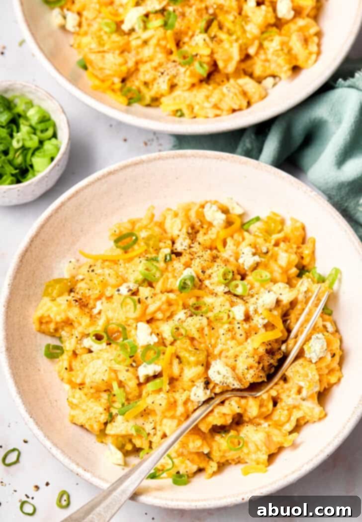 Buffalo Chicken Casserole Recipe with rice and cheese in bowls