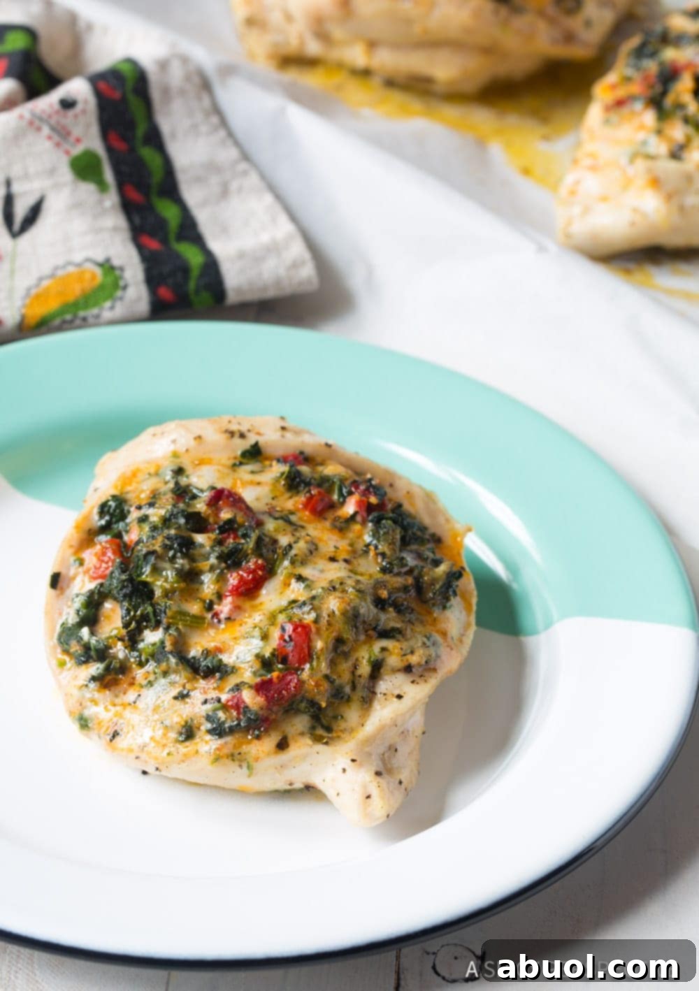 Stuffed chicken breast on a plate. 