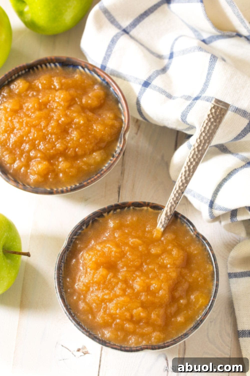 Instant Pot Applesauce in small serving cups with spoon