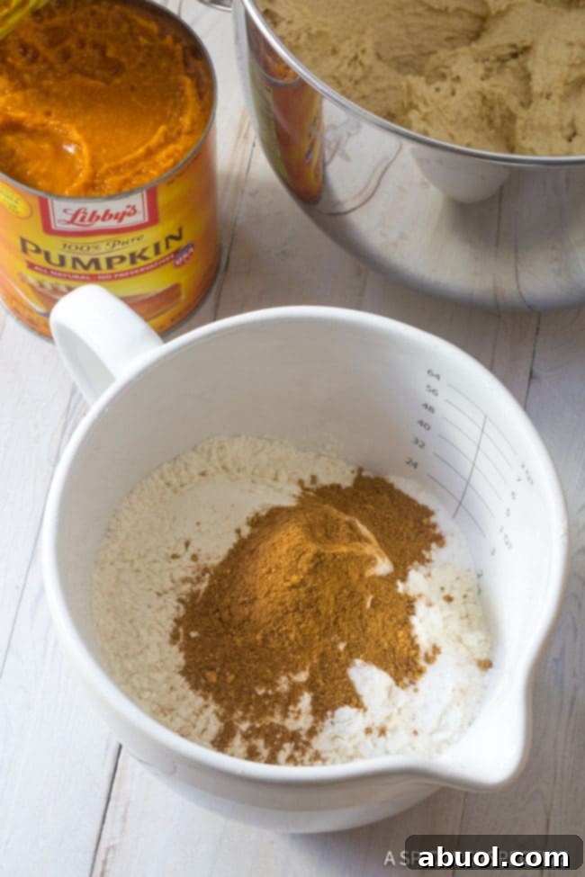 Golden Harvest Pumpkin Sheet Cake 5 Making Pumpkin Texas Sheet Cake - ingredients in bowl