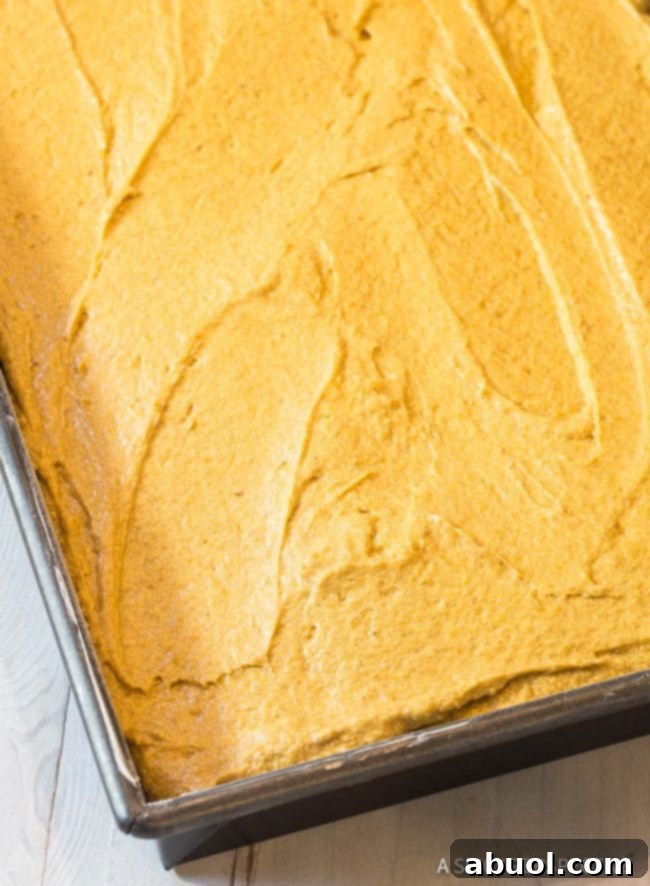 Golden Harvest Pumpkin Sheet Cake 6 How to Make Pumpkin Texas Sheet Cake with Buttermilk Frosting Recipe #ASpicyPerspective