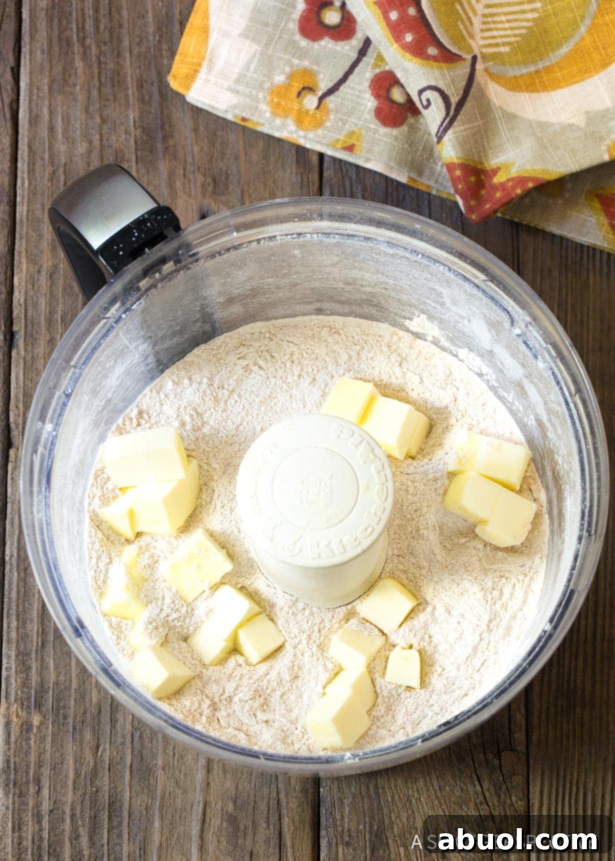 Ingredients for Easy Cinnamon Drop Biscuits in a food processor, ready to be combined