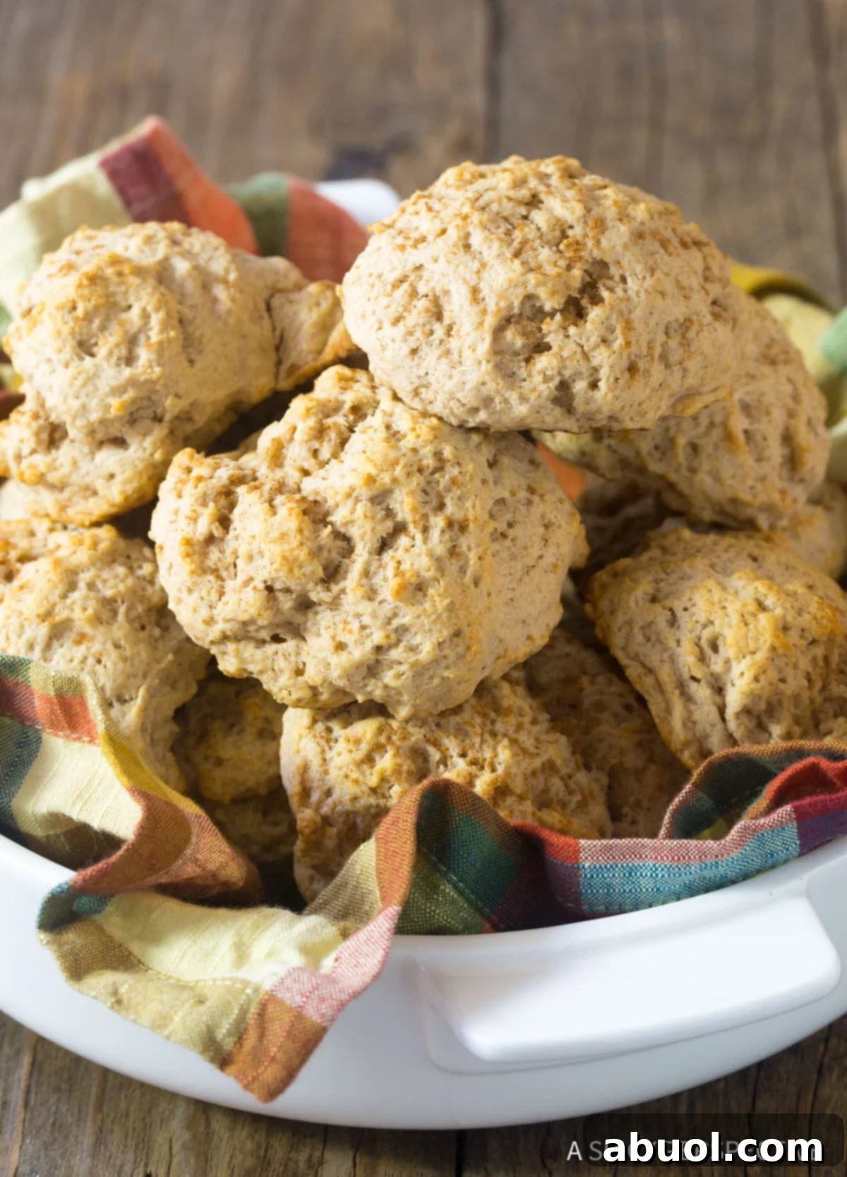 Perfectly baked Easy Cinnamon Drop Biscuits arranged appealingly, showcasing their golden crust and fluffy interior