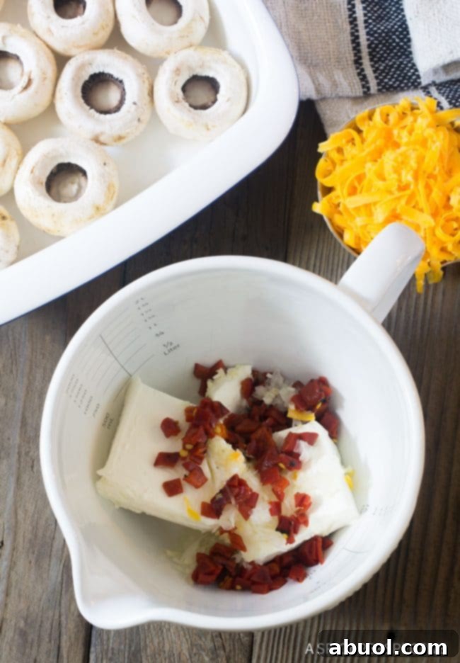 Creamy Dreamy Mushrooms 4 Best Cheese Stuffed Mushrooms filling in mixing bowl