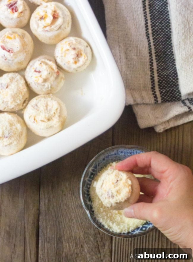 Creamy Dreamy Mushrooms 5 Cream Cheese Stuffed Mushrooms - dunking tops in parmesan cheese