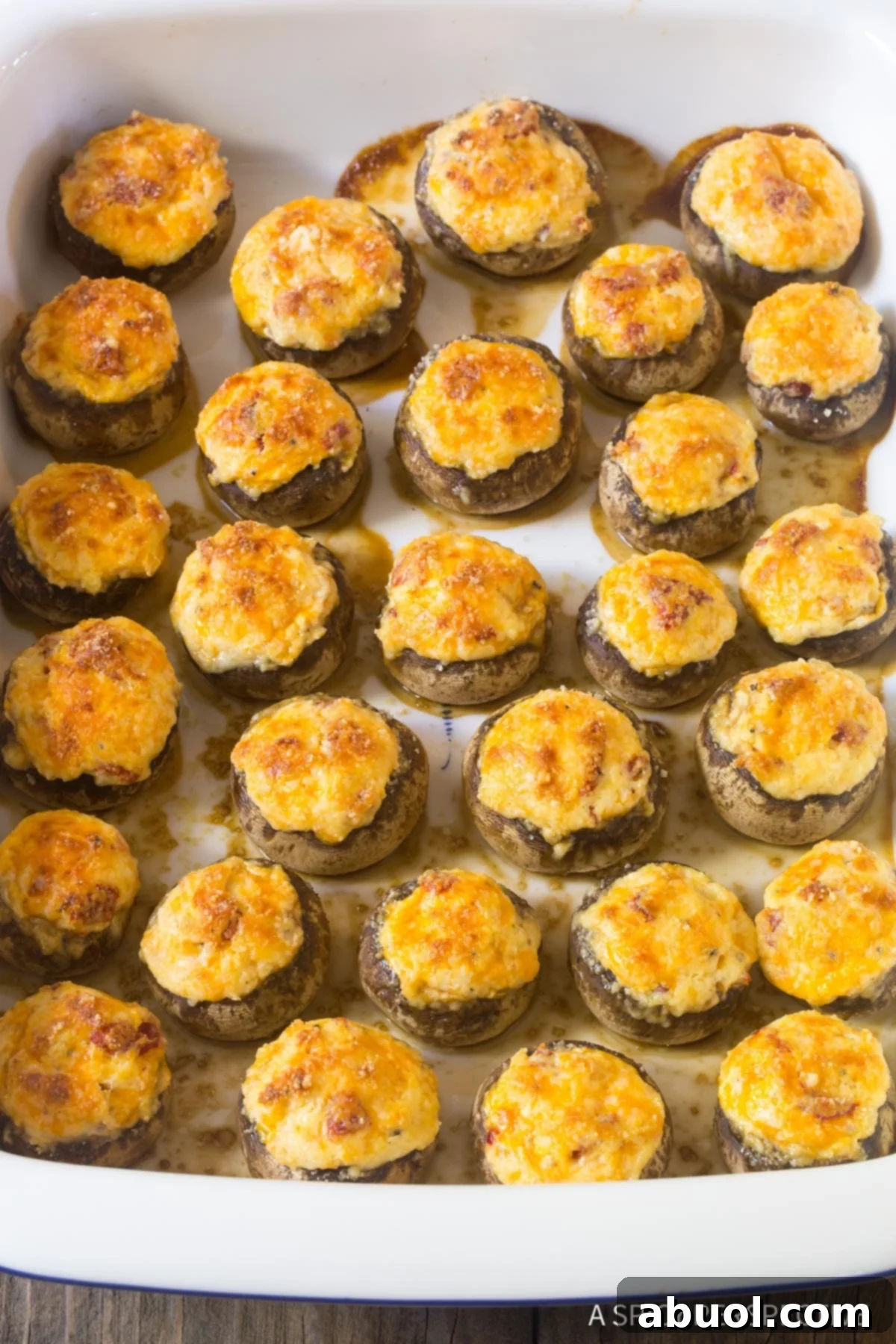 Creamy Dreamy Mushrooms 7 Casserole dish full these melty mushroom caps with three types of cheese