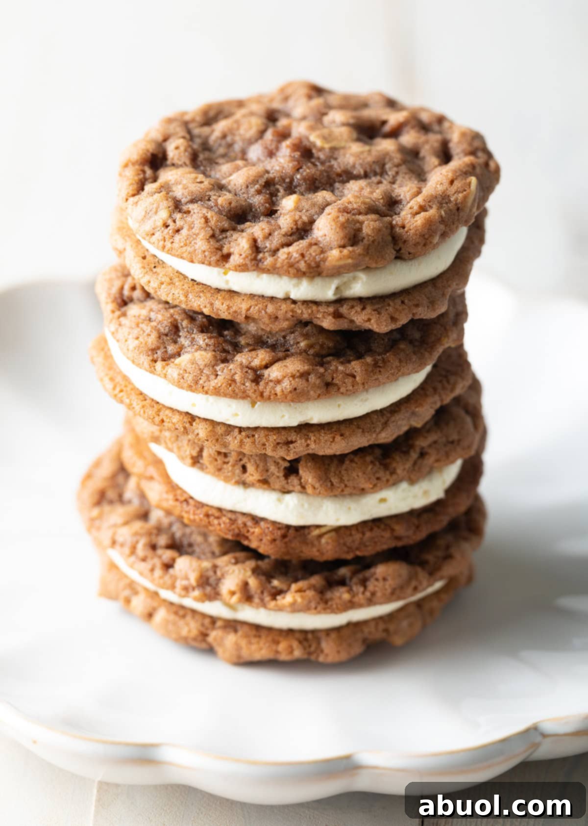 Three oatmeal cream pies stacked on top of each other. 