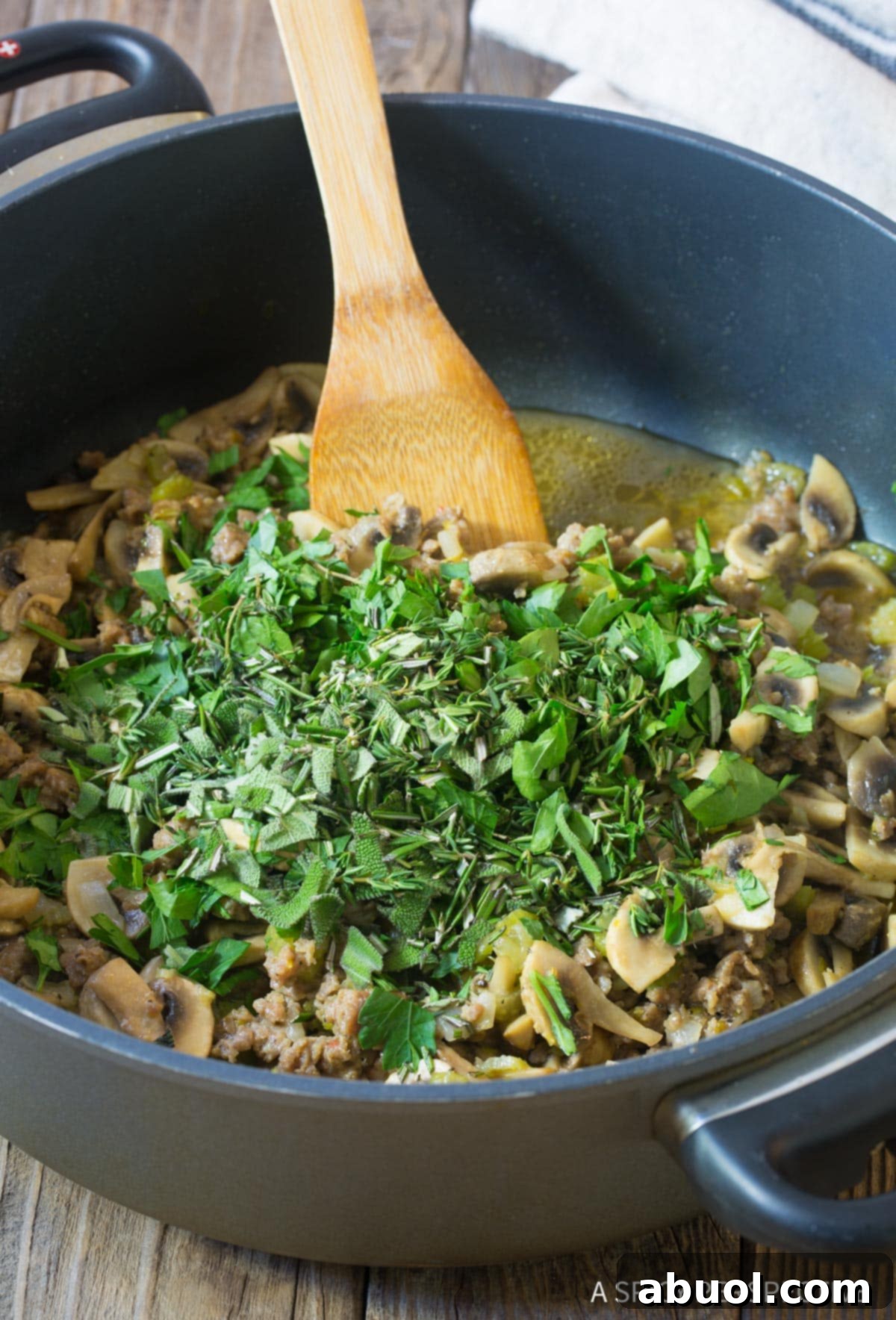 Savory Sausage & Wild Mushroom Stuffing 6 Adding fresh herbs to Thanksgiving stuffing