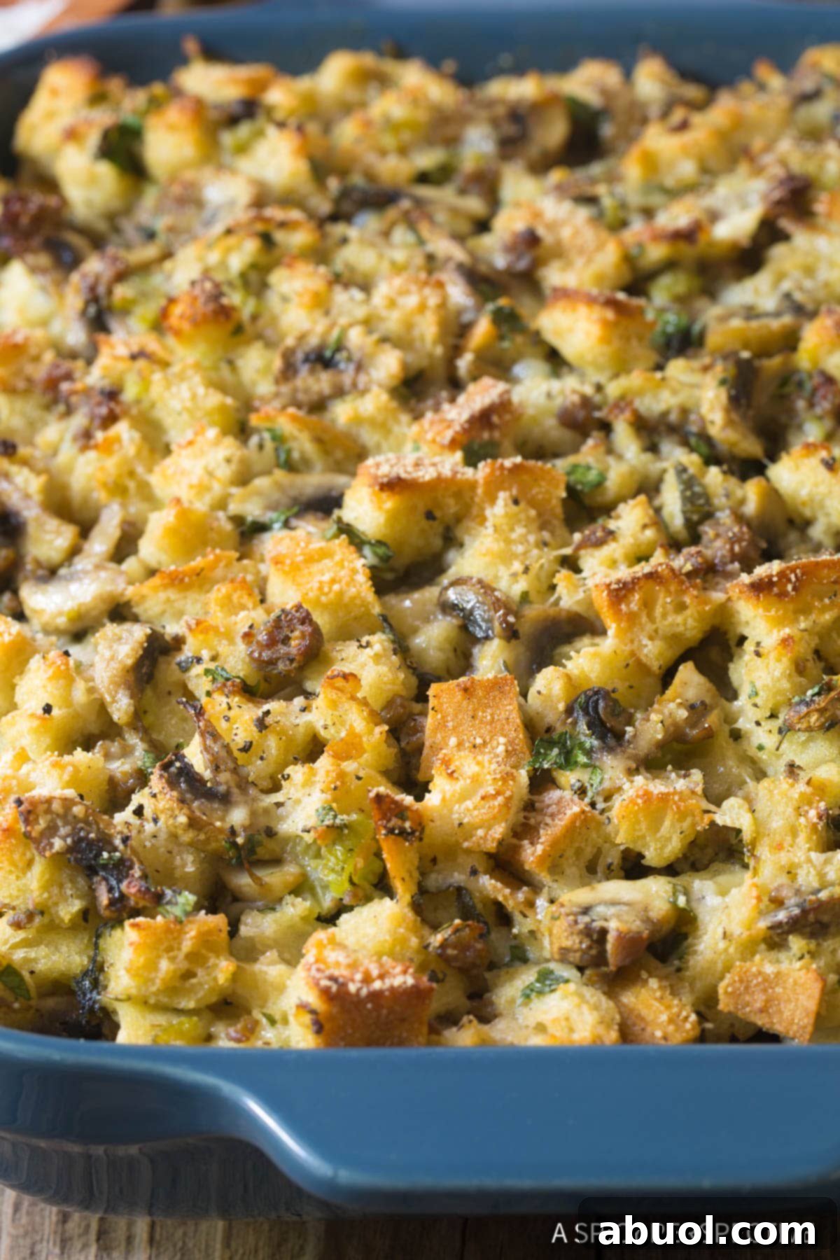 Savory Sausage & Wild Mushroom Stuffing 9 Large pieces of golden brown Mushroom Sausage Stuffing with fresh herbs
