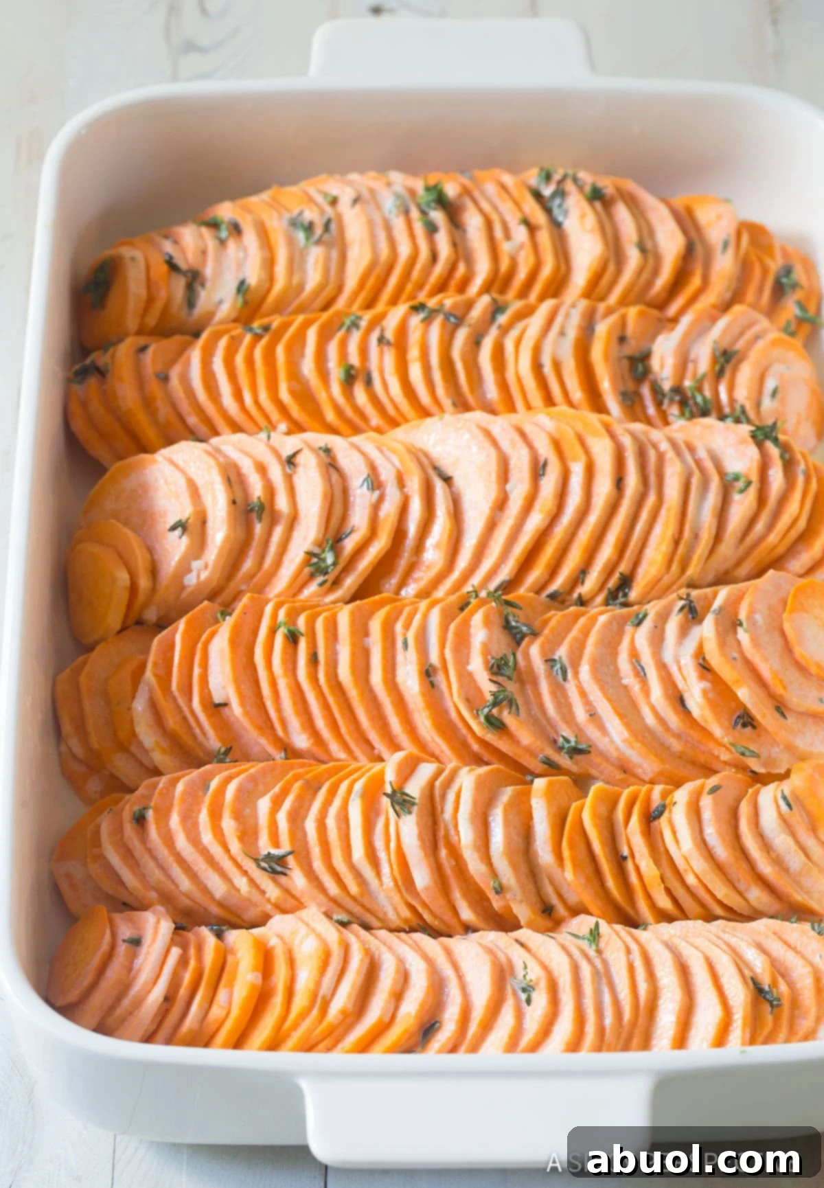 Scalloped Sweet Potato Au Gratin - in casserole dish before baking