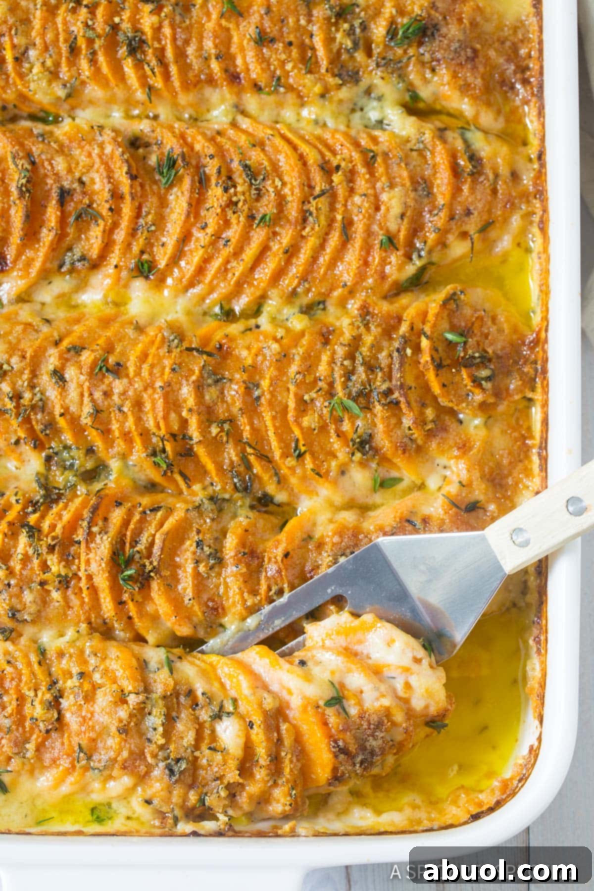 Sweet Potato Au Gratin Recipe - overhead shot with spatula
