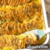 Garlic Butter Scalloped Sweet Potatoes Recipe #ASpicyPerspective #Thanksgiving
