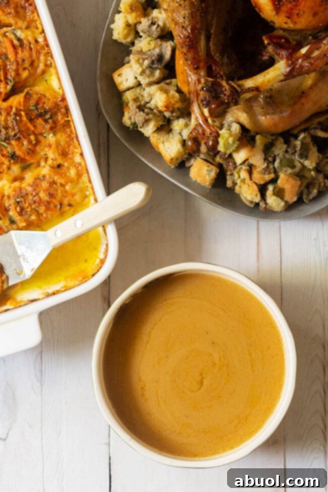 The Ultimate Turkey Gravy 8 Best homemade Thanksgiving gravy recipe, an overhead shot showing its smooth texture.