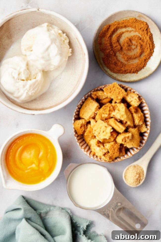 All the fresh ingredients required for preparing easy pumpkin spice milkshakes, neatly arranged and ready for blending.