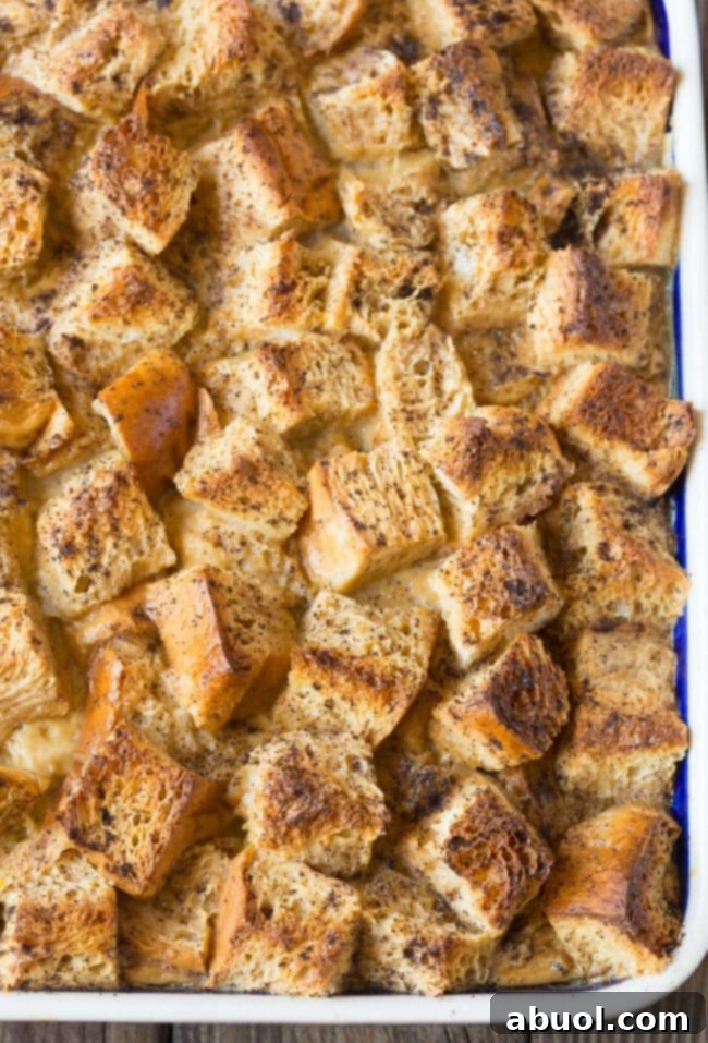Baked bread pudding in a baking dish.