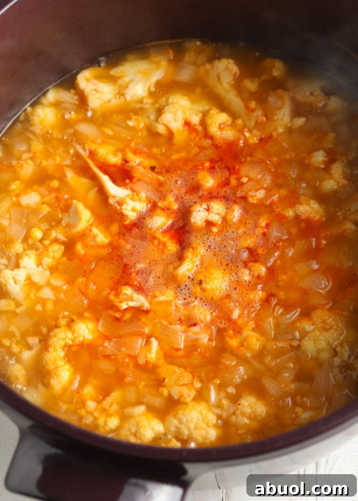 How to Make Cauliflower Soup - Simmer cauliflower until tender.