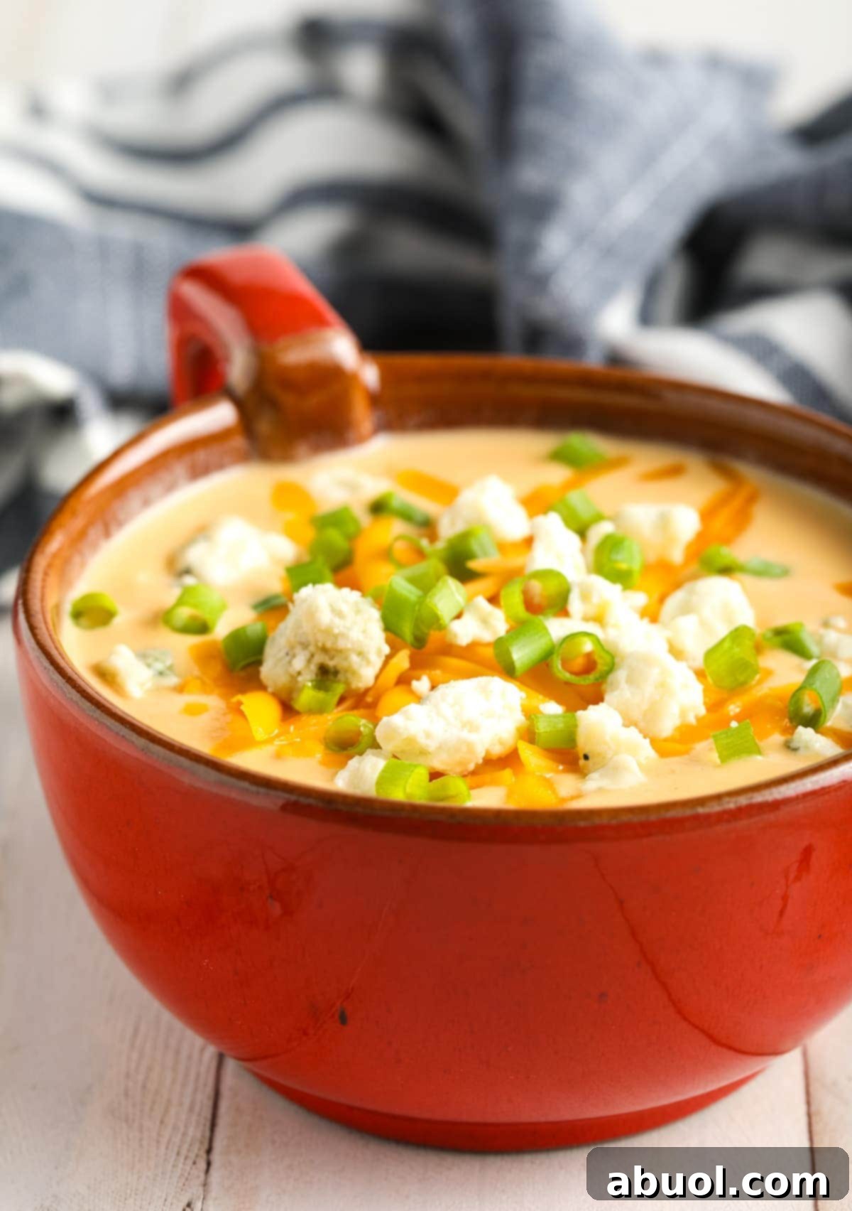 Cauliflower Cheese Soup - close up of toppings in bowl. 
