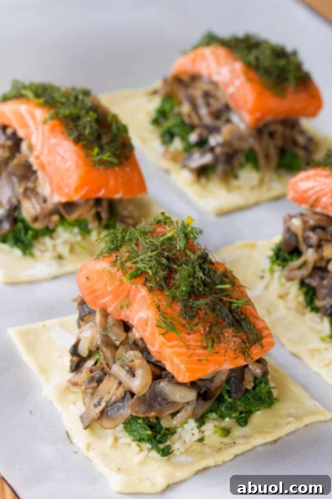 Gourmet Salmon En Croute 8 Sprinkling fresh dill over the salmon layer in Salmon Coulibiac