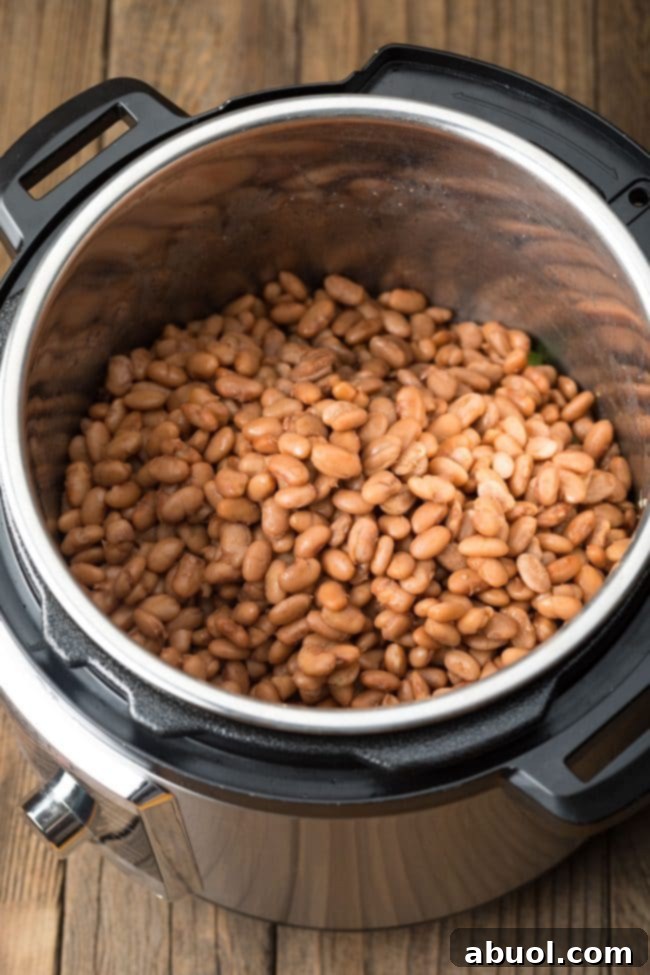 Overhead view of cooked beans in an instant pot. 