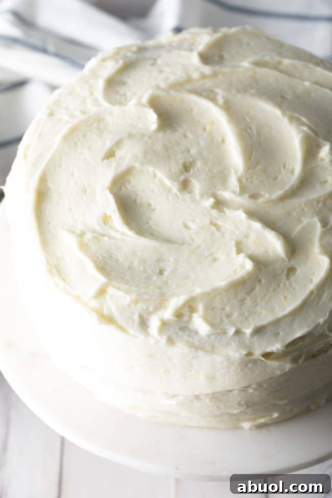 Lemon Buttermilk Cake on a cake stand.