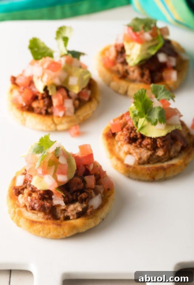 Mexican Sopes loaded with toppings