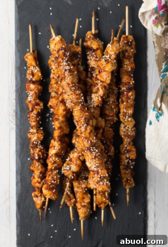 Delicious Korean Chicken Skewers on a plate, ready to serve.