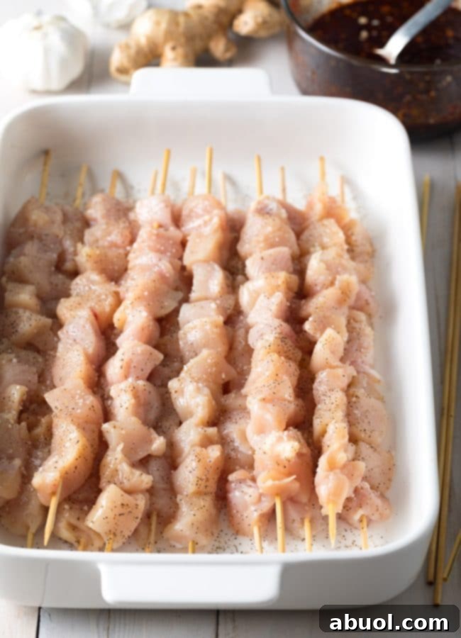 Step-by-step image of preparing Korean Chicken Skewers, showing chicken cubes.
