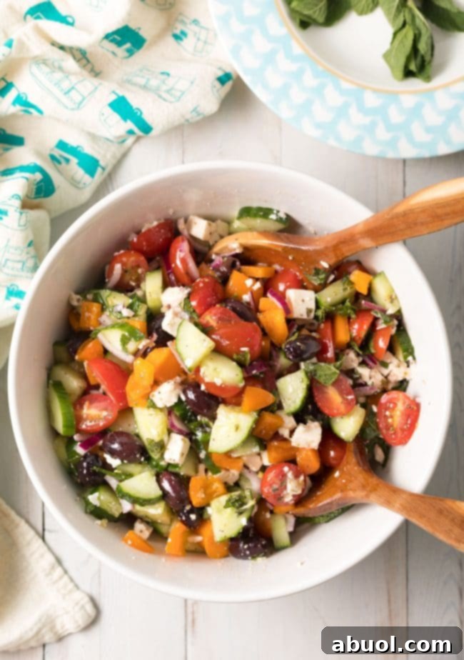 Authentic Horiatiki (Greek Village Salad) Recipe - A close-up of the perfectly chopped ingredients, showcasing texture and vibrant colors.