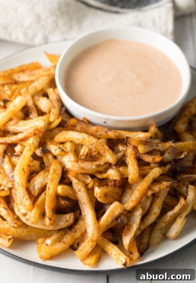 Baked Turnip Fries Recipe on plate with dipping sauce