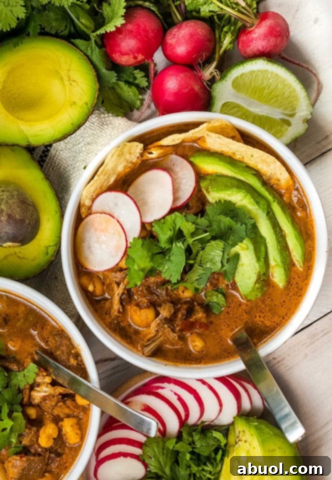 Perfect-Red-Posole-Recipe Mexican pork pozole recipe in bowls ready to serve