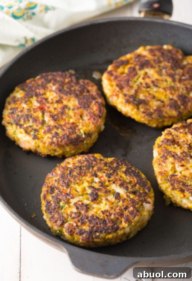 Gourmet Shrimp Burgers 11 Cooking Caribbean Shrimp Patties in a hot skillet until golden and perfectly cooked.