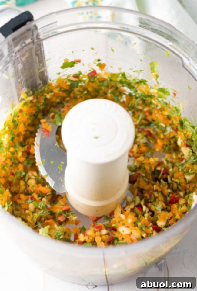Gourmet Shrimp Burgers 7 Finely chopped vegetables and herbs, ready to be mixed into the shrimp burger patties.