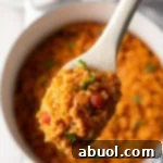 Easy Spanish Rice Recipe (Mexican Rice - Arroz Rojo) - Fluffy, flavorful rice perfect for any Mexican meal.