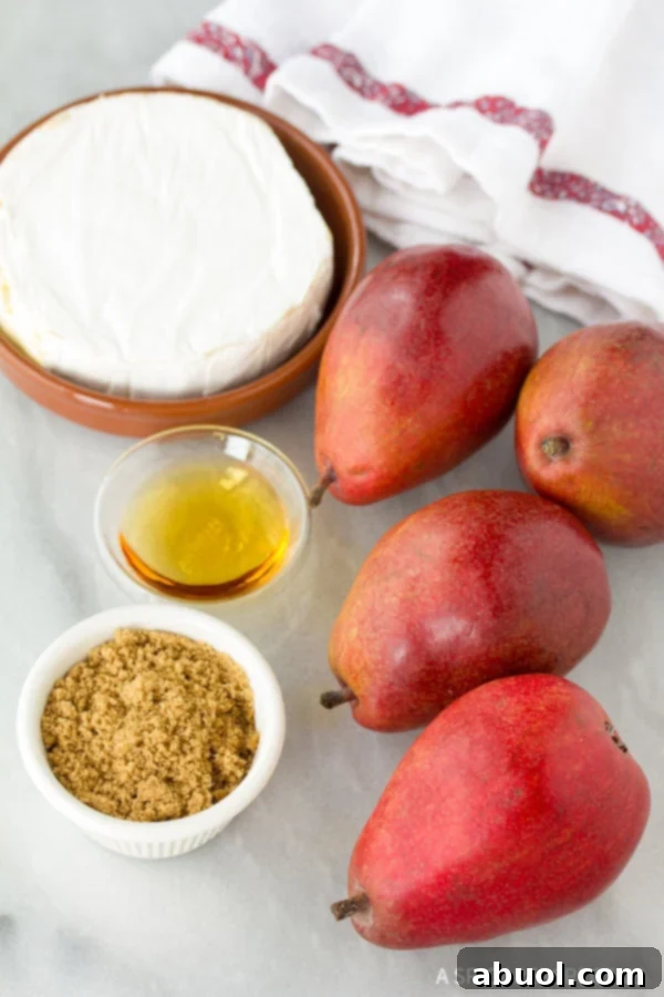 Ingredients laid out for a Pear and Brie Tart recipe
